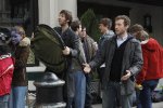 BONES:  Hodgins (TJ Thyne, R) and Jeffersonian intern Colin Fisher (Joel David Moore, L) camp out for tickets to the premiere of the new James Cameron film "Avatar" in the BONES episode "The Gamer in the Grease" airing Thursday, Dec. 3 (8:00-9:00 PM ET/PT) on FOX.  Also pictured:  Kaylee Defer (R).  Â©2009 Fox Broadcasting Co.  Cr:  Greg Gayne/FOX