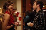 BONES:  Angela (Michaela Conlin, L) and Hodgins (TJ Thyne, R) enjoy a Christmas celebration in the BONES episode "The Goop on the Girl" airing Thursday, Dec. 10 (8:00-9:00 PM ET/PT) on FOX.  ©2009 Fox Broadcasting Co.  Cr:  Greg Gayne/FOX