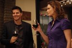 BONES:  Booth (David Boreanaz, L) and Brennan (Emily Deschanel, R) toast their friends during a Christmas celebration in the BONES episode "The Goop on the Girl" airing Thursday, Dec. 10 (8:00-9:00 PM ET/PT) on FOX.  ©2009 Fox Broadcasting Co.  Cr:  Greg Gayne/FOX